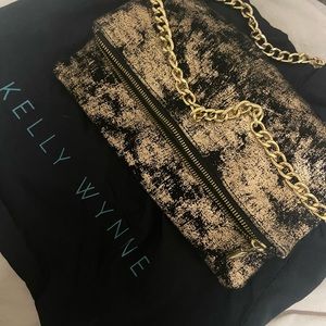 Kelly Wynn’s Flap Over Crossbody bag